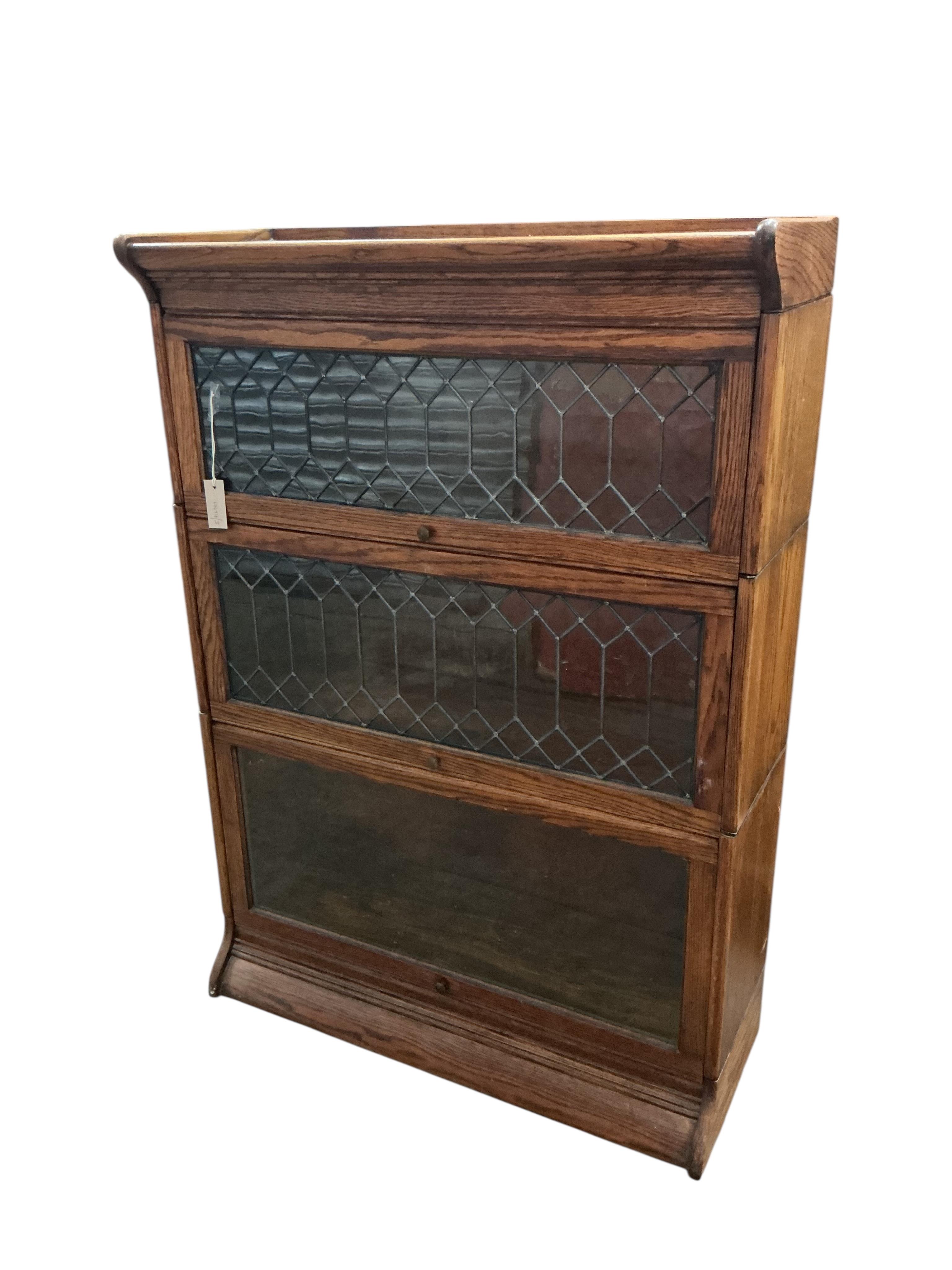 A Globe Wernicke style three section bookcase, width 86cm, depth 34cm, height 123cm
